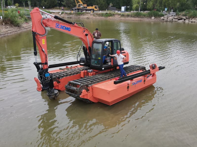 Pontoons Equipped Amphibious Excavator Working in Lake River