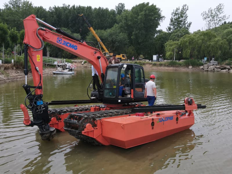 Pontoons Equipped Amphibious Excavator Working in Lake River